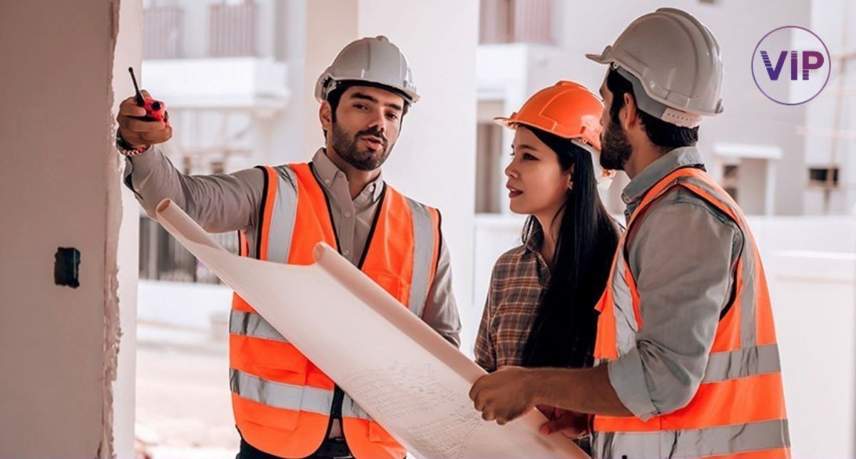 A decorative image for the blog "Sub-Metering Errors" of Three individuals with orange vests looking at building plans. 